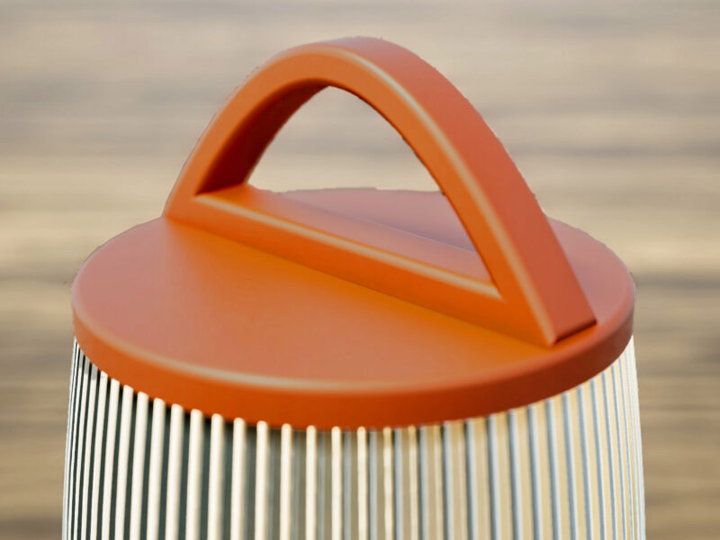 Poignée terra cotta d'une lampe nomade à LED.